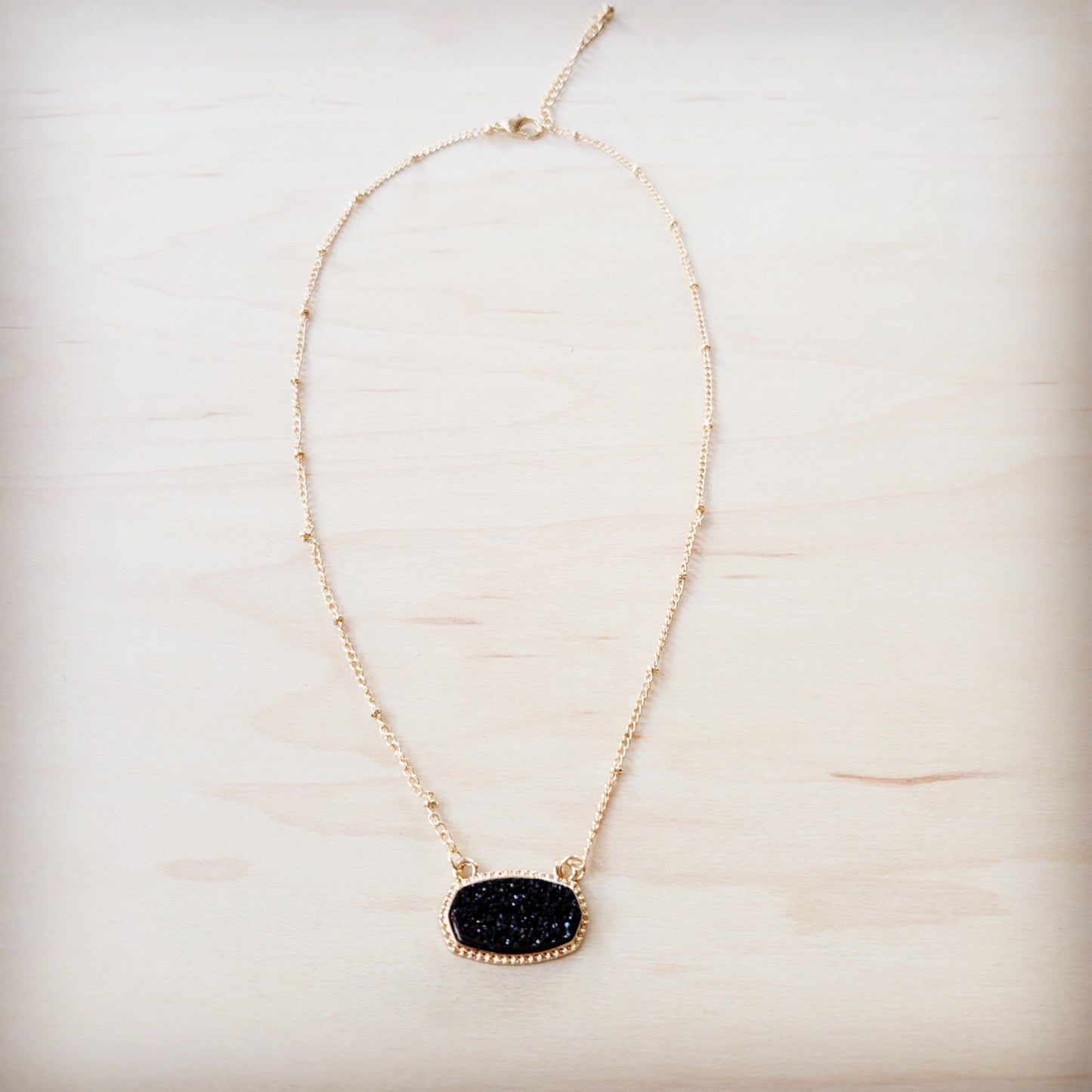 Knotted Gold Chain Necklace with Black Stone Pendant