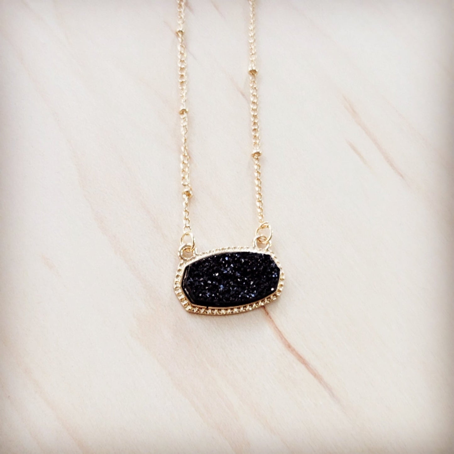 Knotted Gold Chain Necklace with Black Stone Pendant