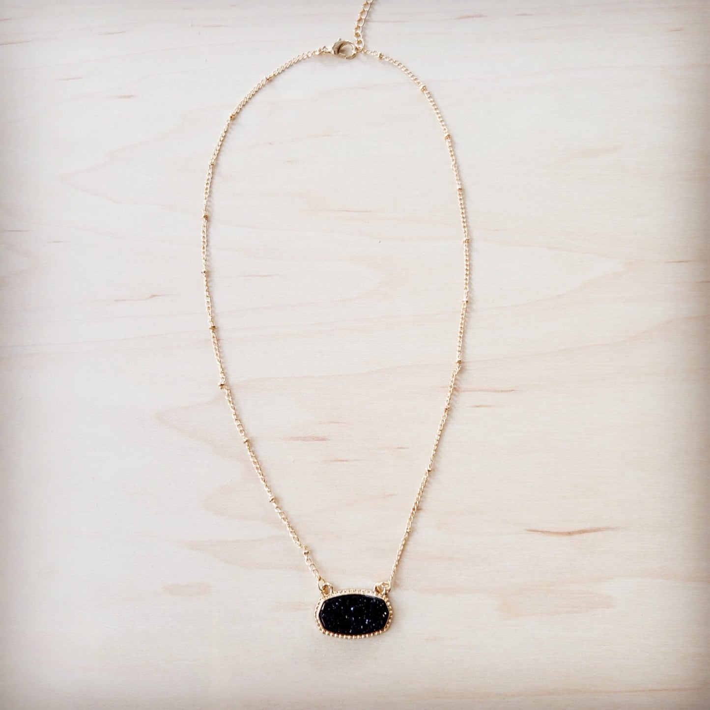 Knotted Gold Chain Necklace with Black Stone Pendant