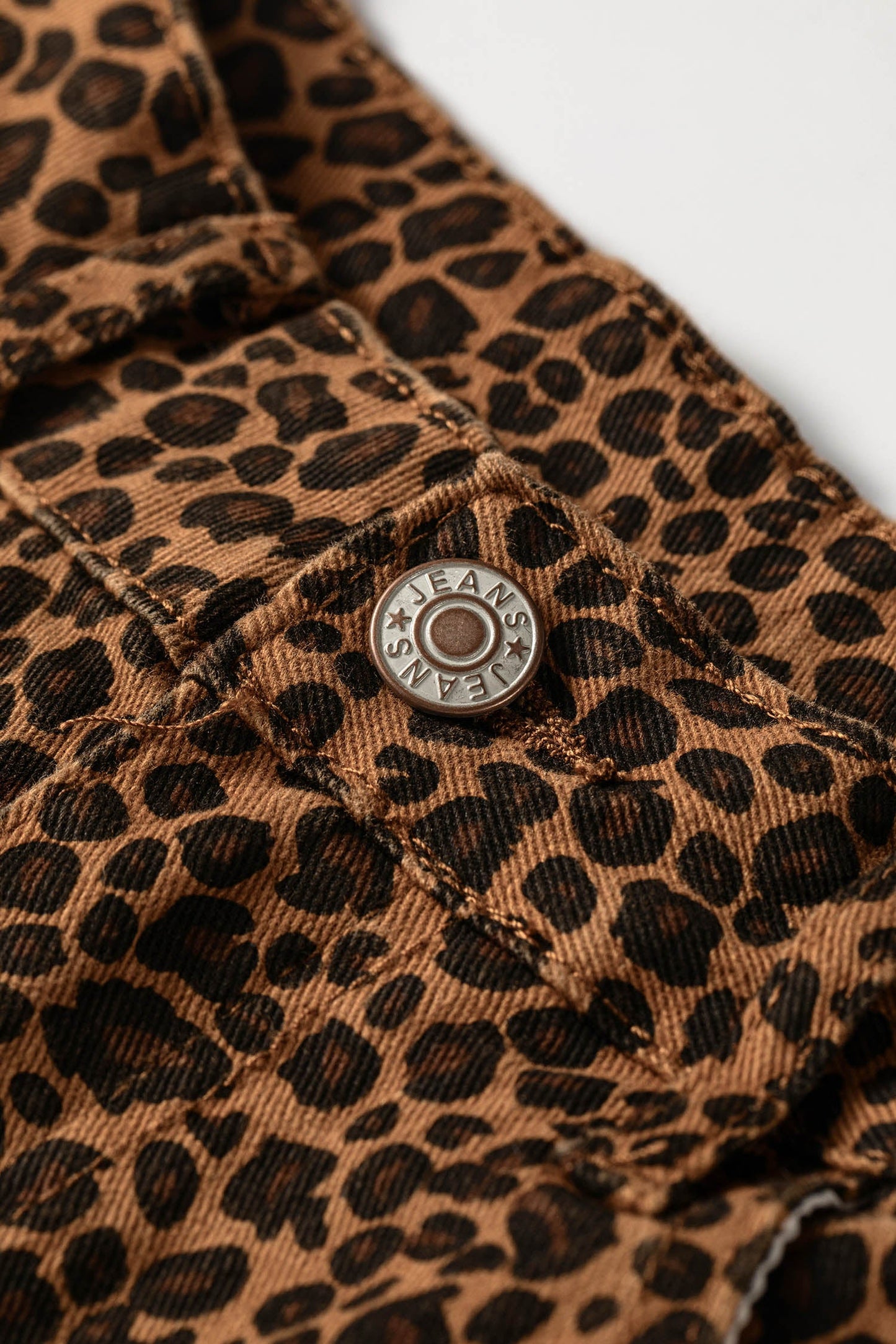 Leopard Ruffle Hem Shift Jeans
